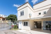 Excelente casa em condomínio com 2 dormitórios, banheiro social, living para 2 ambientes, lavabo, cozinha planejada, com fogão, geladeira e mesa de jantar,  ar condicionado novos nos dois dormitórios,