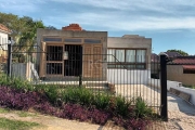 Casa no bairro Belém Velho, em fase final de construção, em andamento a colocação do gesso e retoques finais, contendo 2 dormitórios, amplo living, cozinha, banheiro social com box e claraboia, bom pá