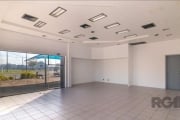 Libertas Imóveis aluga excelente loja comercial com aproximadamente 85m² no bairro Sarandi. Imóvel com iluminação natural, amplo espaço, piso cerâmico, depósito, banheiro social. Possui vagas rotativa