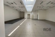 VENDO Excelente loja com aproximadamente 450m² de área real privativa, muito bem localizada na avenida Protásio Alves. Estacionamentop carros na frente.&lt;BR&gt;&lt;BR&gt;Loja/prédio construído por u