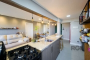 Apartamento totalmente reformado com 81,50m², 2 dormitórios, living para 02 ambientes, lavabo, cozinha americana com churrasqueira, área de serviço integrada, banho social, dependência de empregada, p