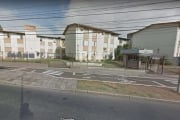 Apartamento com 2 dormitórios, living, banheiro social, cozinha, área de serviço em condomínio fechado com porteiro eletrônico e portaria 24 hs.