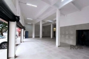 Libertas imobiliária vende loja na Av. Assis Brasil com 530m², sendo pavimento térreo com 430m², loja ampla, pé direito duplo, vitrine com cortinas metálicas automatizadas e 2 banheiros, mais mezanino