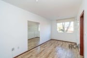 APARTAMENTO 02 DORMITÓRIOS AMPLA SALA PARA DOIS AMBIENTES, COZINHA, ÁREA DE SERVIÇO, BANHEIRO SOCIAL, TODO EM PISO FRIO. DESOCUPADO.