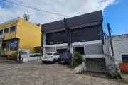 Libertas Imobiliária aluga loja com 450m² de área privativa, localizado no bairro Vila Jardim. Imóvel com recepção, amplo salão, mezanino, pé direito amplo, cortinas de ferro, fachada com vidro e 2 ba