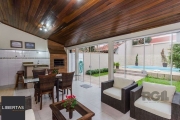 Excelente casa de 379m² com 3 dormitórios, piscina e 4 vagas.