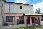 Linda casa em loteamento com acesso somente de moradores, com 2 dormitórios sendo uma suíte com sacada, amplo living, cozinha, lavabo, garagem coberta e fechada, quiosque nos fundos com churrasqueira 