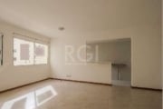 Apartamento de 2 dormitórios, no bairro Partenon, com living 2 ambientes, cozinha americana com pia, área de serviço com tanque, banheiro com box, vaga coberta para 01 carro, piso porcelanato, 12º and