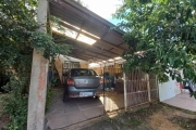 Ótima Casa térrea de 1 dormitório, podendo ser transformado em 2, living amplo, cozinha, depósito, garagem coberta, árvores frutíferas, pátio amplo nos fundos. Fica um ar condicionado. Aceita financia