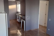 Apartamento 2 dormitórios, 1 vaga, bairro Hípica.      &lt;BR&gt; &lt;BR&gt;Belíssimo apartamento localizado na Hípica,  dispõem de dois dormitórios, um banheiro, uma cozinha, área de serviço, sala de