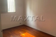 Apartamento de 55m², 2 dormitórios, 1 sala, cozinha, e área de serviço, com vaga de garagem.