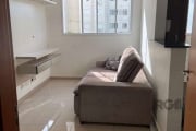 Apartamento desocupado,  2 dormitórios, living 2 ambientes, sala de jantar e sala de estar,  cozinha americana com armários embutidos, área de serviço e  banheiro.  Armários nos dormitórios. 1  vaga d