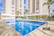 Lindo apartamento três dormitórios, sendo uma suíte.&lt;BR&gt;Living dois ambientes, cozinha americana e área de serviço.&lt;BR&gt;Imóvel em andar alto ficando semimobiliado com móveis planejados, ban