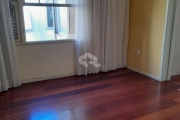 Apartamento 2 dormitórios com sacada e de frente, bairro São Geraldo, em Porto Alegre/RS.