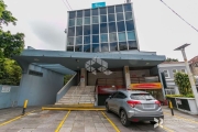 Sala comercial de 227m² privativos em prédio com elevador e portaria.