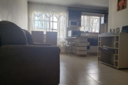 Apartamento semimobiliado de 2 dormitórios com 1 box de garagem