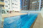 Apartamento à venda na Guilhermina, Praia Grande-SP: 2 quartos, 1 suíte, 2 salas, 2 banheiros, 1 vaga de garagem, 79m² de área. Venha conferir!