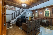 Casa de vila para venda com 5 quartos, sendo 4 suítes, 311m²