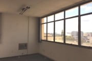 Sala comercial no centro, prédio ACMCJ, desocupada, estuda permuta, com 01 vaga de garagem coberta