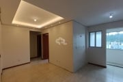 Apartamento 02 dormitórios com suíte, churrasqueira, com vaga garagem coberta à venda bairro Aririú, Palhoça