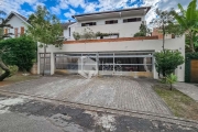 Casa tipo para venda com 3 quartos, sendo 3 suítes, 700m²