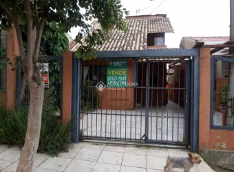 Casa com 3 quartos à venda na Rua Corujas, 635, Jardim Algarve, Alvorada, 120 m2 por R$ 400.000
