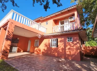 Casa com 2 quartos à venda na Rua Águias, 382, Jardim Algarve, Alvorada, 110 m2 por R$ 390.000