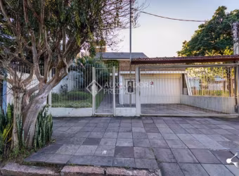 Casa com 3 quartos à venda na Rua Delfino Riet, 287, Santo Antônio, Porto Alegre, 322 m2 por R$ 1.300.000