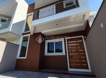 Casa com 3 quartos à venda na Rua Tenente Antônio João, 853, Estância Velha, Canoas, 124 m2 por R$ 798.000