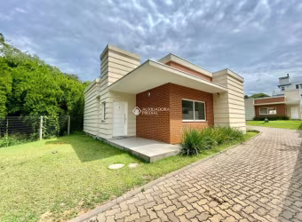 Casa em condomínio fechado com 3 quartos à venda na Rua Canísio Binsfeld, 226, Hípica, Porto Alegre, 123 m2 por R$ 599.000