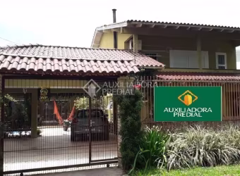 Casa com 4 quartos à venda na Avenida Perimetral, 399, Centro, Guaíba, 200 m2 por R$ 1.170.000