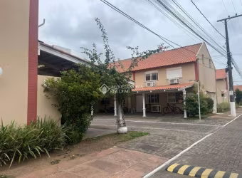 Casa em condomínio fechado com 2 quartos à venda na Rua Treze de Maio, 630, Rio Branco, Canoas, 103 m2 por R$ 280.000