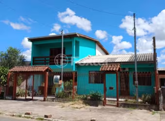 Casa com 3 quartos à venda na Rua Taimbé, 414, Sumaré, Alvorada, 205 m2 por R$ 389.900