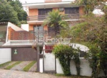 Casa com 3 quartos à venda na Avenida Fábio Araújo Santos, 1650, Nonoai, Porto Alegre, 279 m2 por R$ 957.500