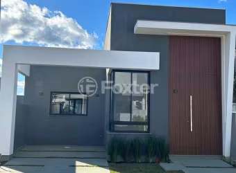 Casa em condomínio fechado com 3 quartos à venda na Estrada Caminho do Meio, 2771, Cocão, Viamão, 94 m2 por R$ 590.000