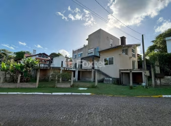 Casa em condomínio fechado com 4 quartos à venda na Rua Cangerana, 400, São Lucas, Viamão, 400 m2 por R$ 700.000