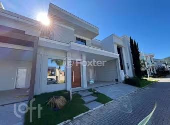 Casa em condomínio fechado com 3 quartos à venda na Avenida Deltaville, 47, Beira Rio, Biguaçu, 176 m2 por R$ 1.350.000