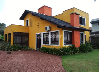 Casa em condomínio fechado com 3 quartos à venda na Rua Grápia, 97, São Lucas, Viamão, 148 m2 por R$ 800.000