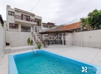 Casa com 4 quartos à venda na Rua Paul Harris, 130, Jardim Itu Sabará, Porto Alegre, 245 m2 por R$ 1.450.000