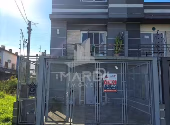 Casa com 3 quartos à venda na Rua Hilário Gonçalves Pinha, 50, Hípica, Porto Alegre por R$ 550.000