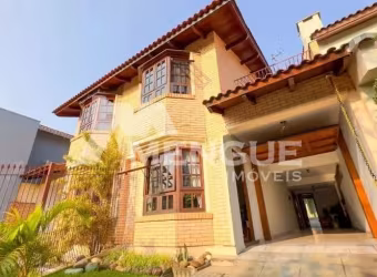 Casa com 3 quartos à venda na Rua Walir Zottis, 540, Jardim Planalto, Porto Alegre por R$ 750.000