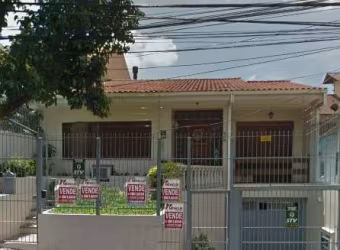 Casa com 5 quartos à venda na Avenida Brasília, 292, Vila Ipiranga, Porto Alegre por R$ 1.170.000