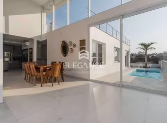 Elegance imóveis vende casa moderna 3 dormitórios suíte pátio com piscina 6 vagas box/garagem Chacara das Pedras Porto Alegre. Comprar R$ 2.700.000,00