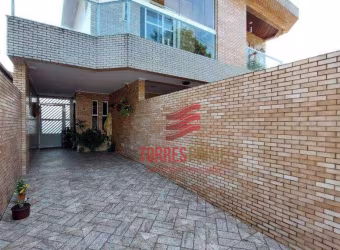 Casa com 3 dormitórios à venda, 116 m² por R$ 682.000,00 - Vila Valença - São Vicente/SP