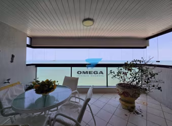 Apartamento reformado vista mar à venda na praia das Pitangueiras no Guarujá I Omega Imoveis