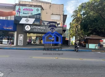 Ponto Comercial no Centro com 5  salas, sendo duas com banheiro, solário, cozinha, varanda, espaço