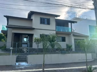 Casa com 4 quartos à venda na Jaqueline, 327, Jansen, Gravataí por R$ 790.000