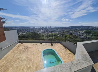 Casa para Venda - 464m², 5 dormitórios, sendo 4 suites, 4 vagas - Nonoai