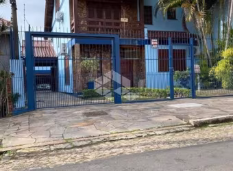 Casa com 4 quartos à venda na Rua Ararás, 344, Sarandi, Porto Alegre, 292 m2 por R$ 1.200.000