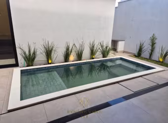 Residência de alto padrão no Condomínio Terras Alpha - Granja Marileusa, Uberlândia-MG: 3 quartos, 3 suítes, 1 sala, 5 banheiros, 2 vagas de garagem, 189,89 m²!